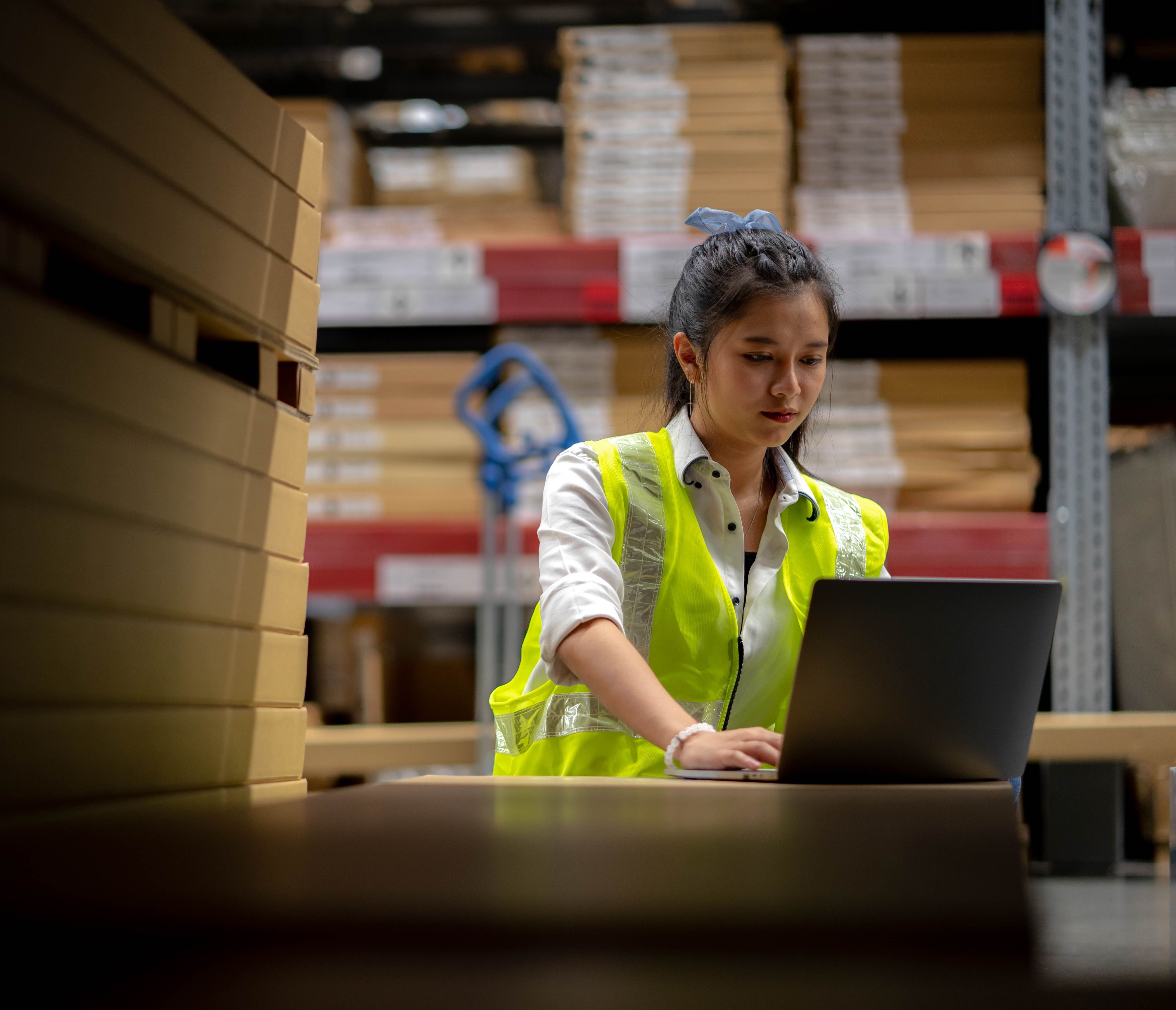 Staff Check stock details on tablet computer