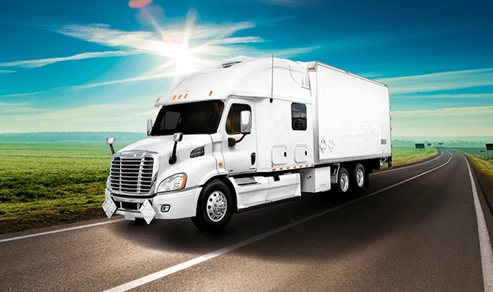 White truck driving on road